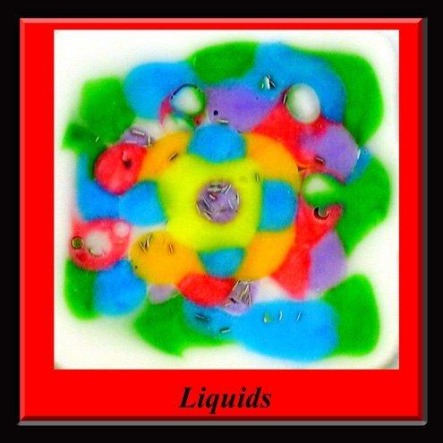 Figure 6. Liquids. An artistic display demonstrating the ease of embedding liquids, not only in a three-dimensional block but also in specific orientation. Liquids prepared from embedding medium colored with food dye.